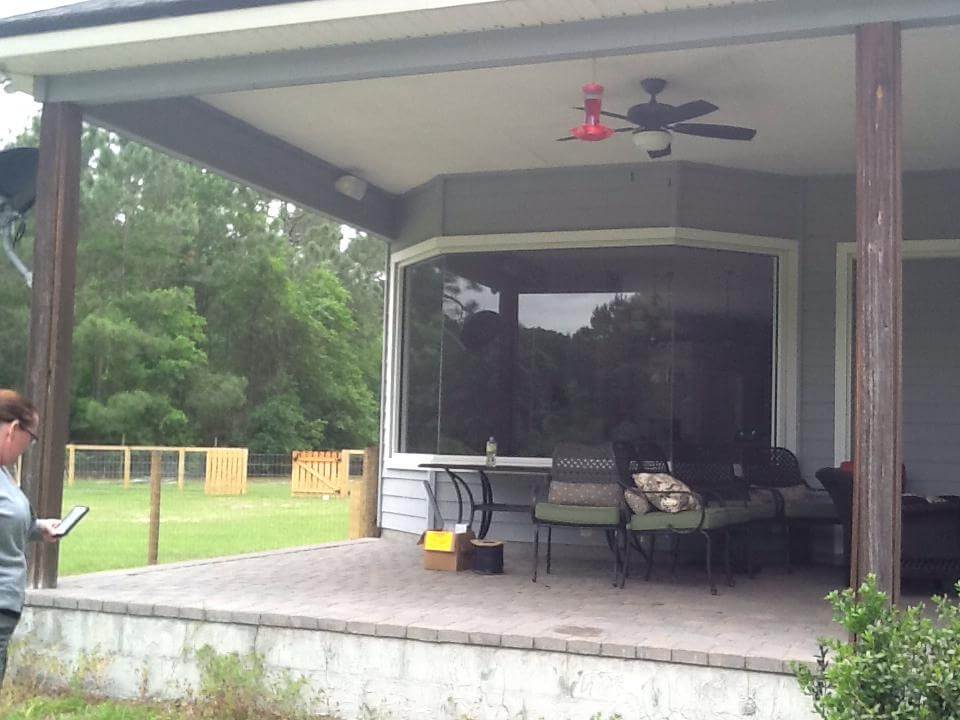 Before picture of a porch to be screened in by Quillco in Fleming Island, Florida